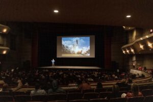 Former astronaut, Mike Massimino, giving a speech at a Distinguished Lecture Series event