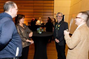 Michael Chabon chatting with UTPB leadership