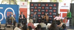 Two women and four men in front of UTPB backdrop