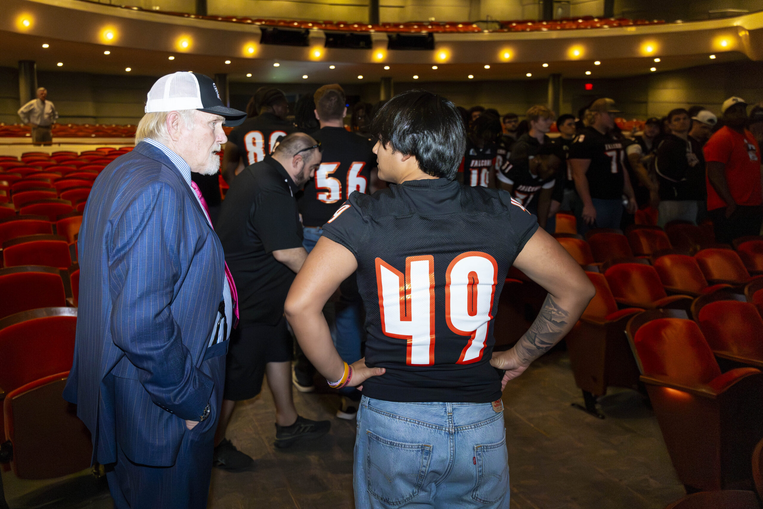 Robert M. Edsel standing at a podium