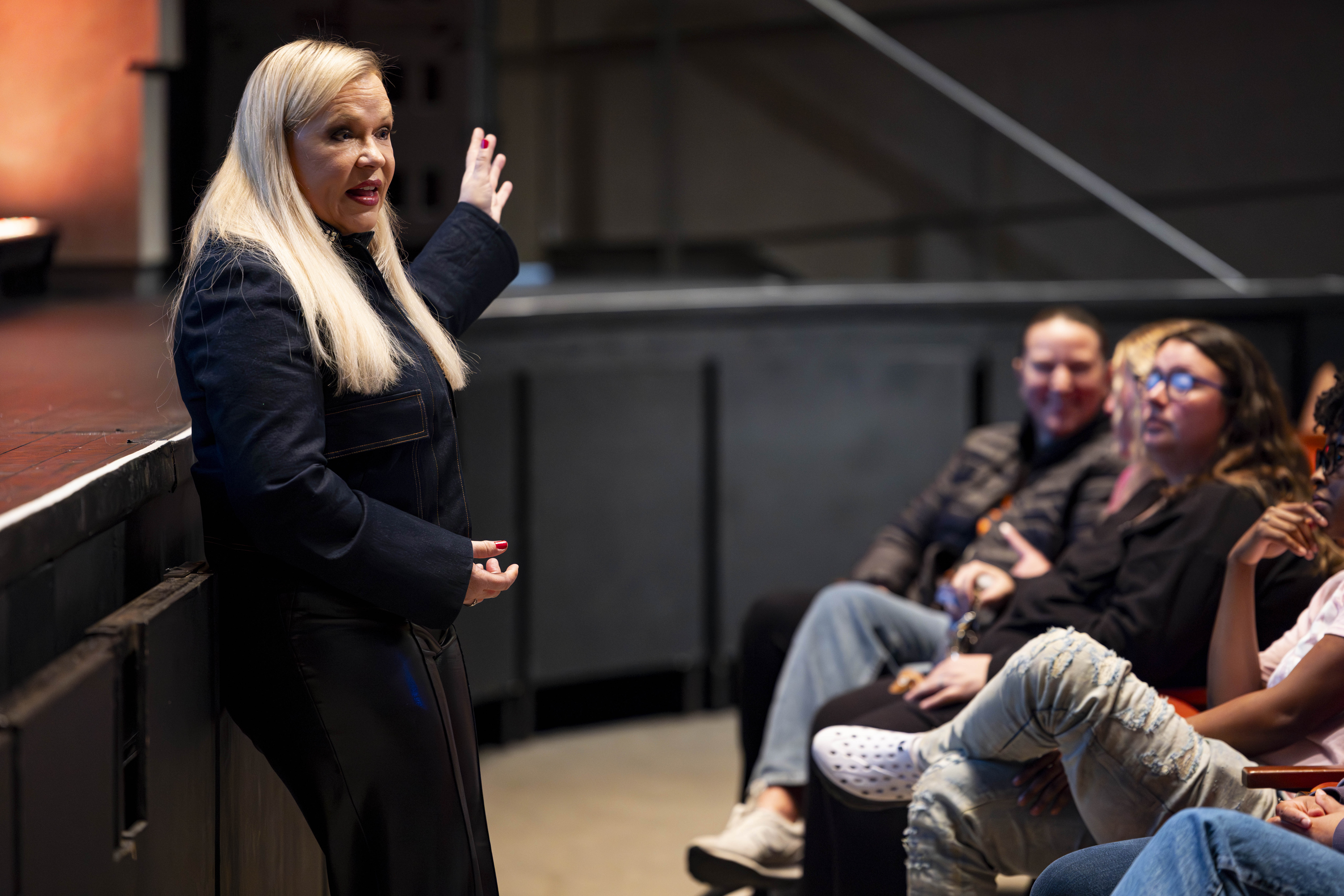 Robert M. Edsel standing at a podium
